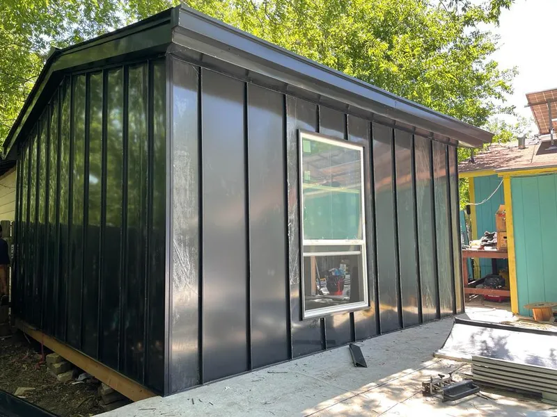 Black standing seam metal wall panels for Metal Roof Installation in Seymour